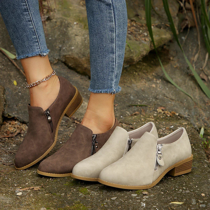 Palmer | SleekShield Zip-Up Ankle Boots